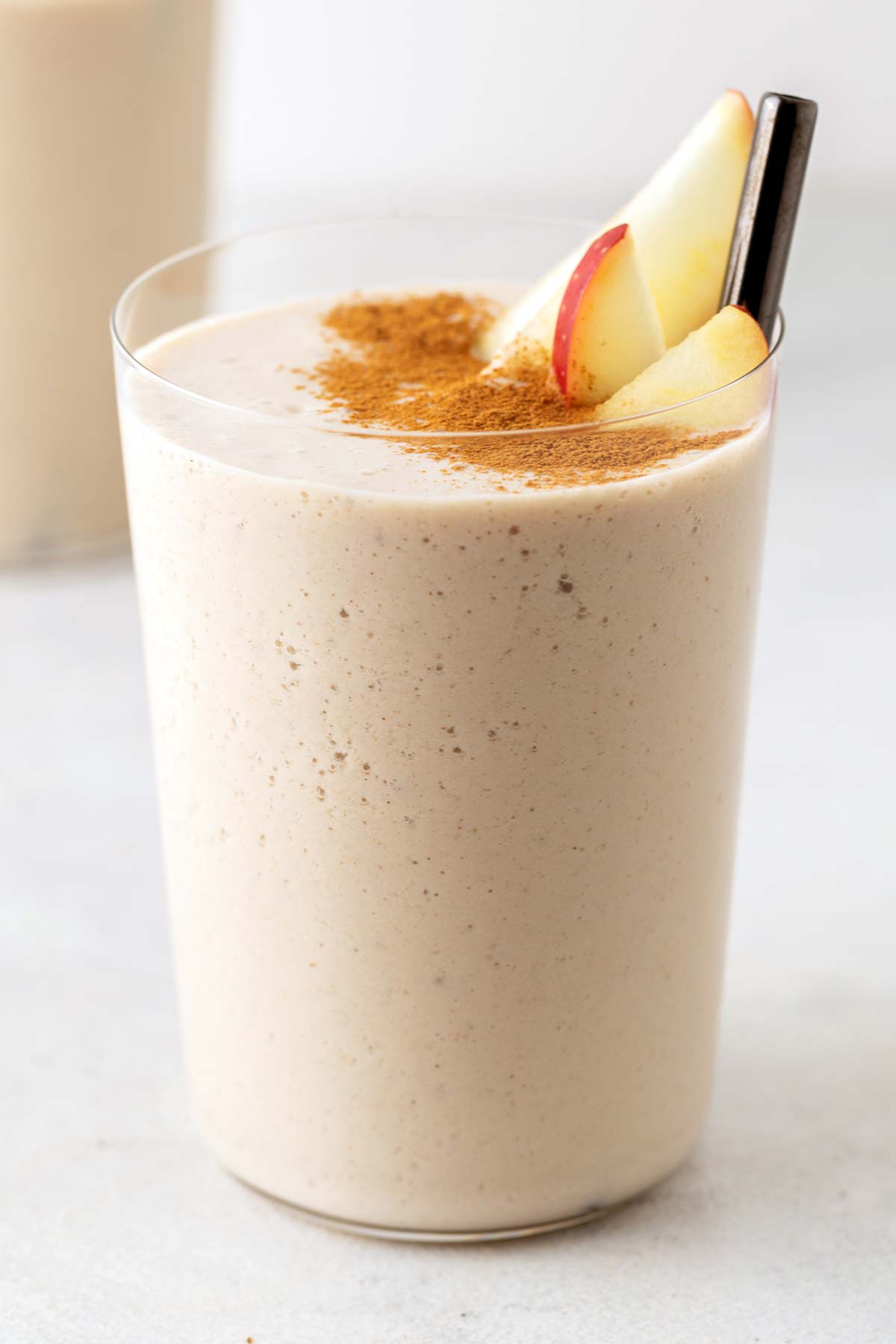 Apple smoothie in a glass.