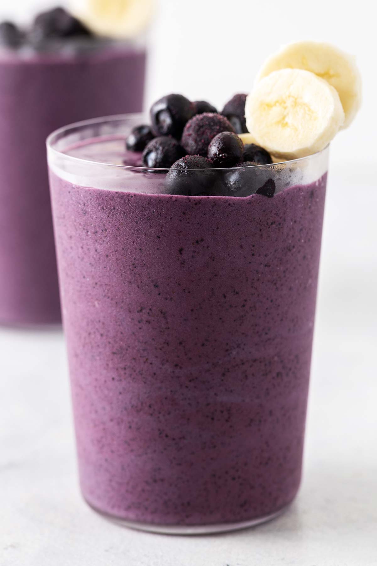 Blueberry smoothie in a glass.