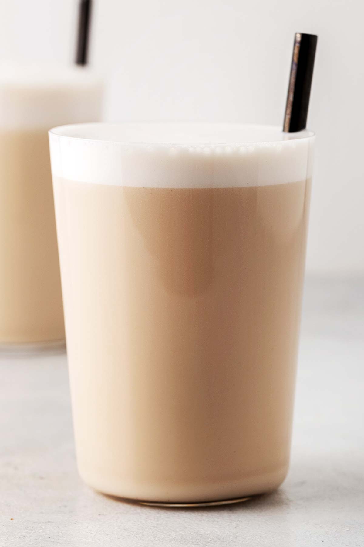 Caramel protein shake in a glass.