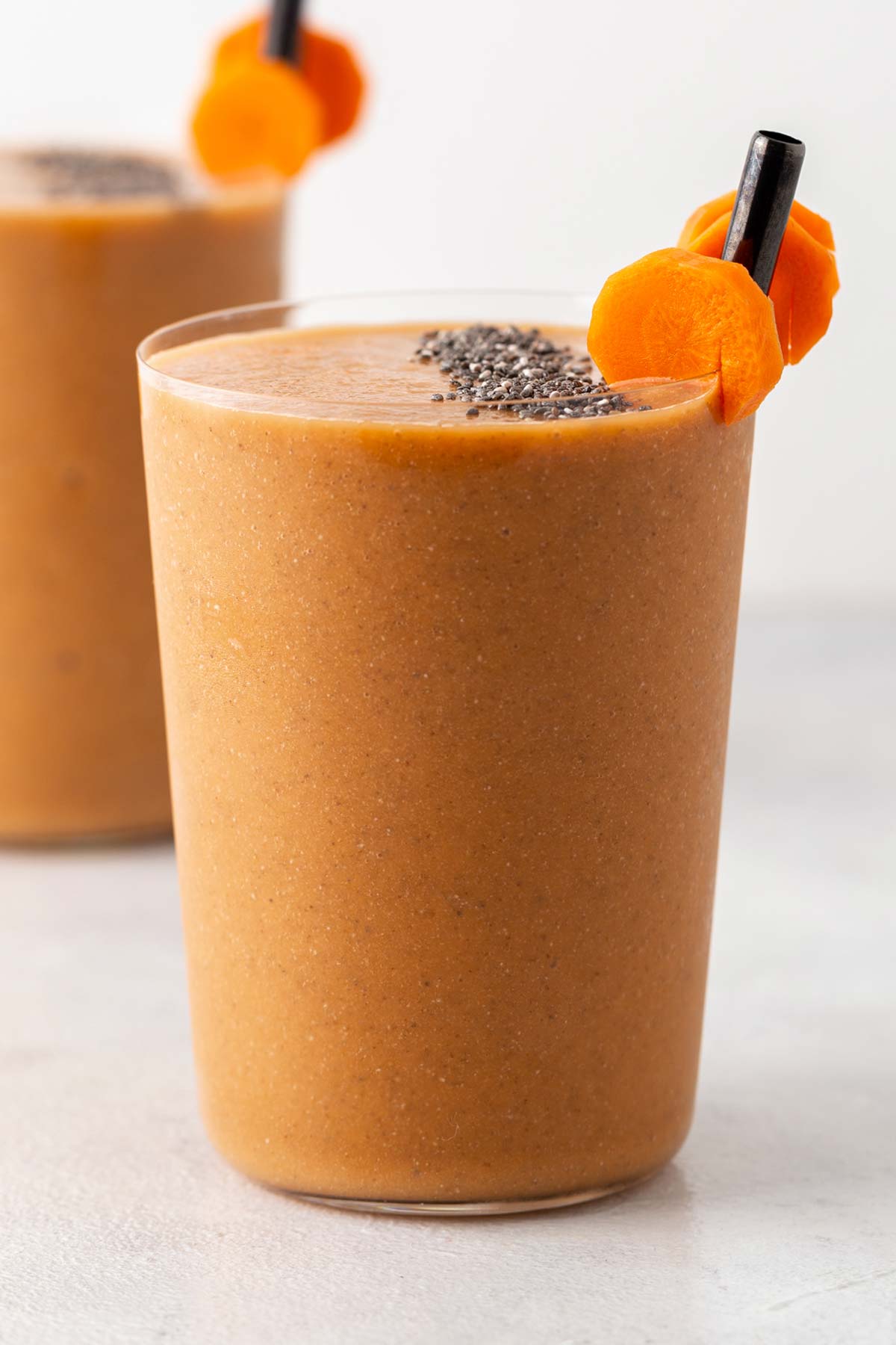 Carrot smoothie in a glass.
