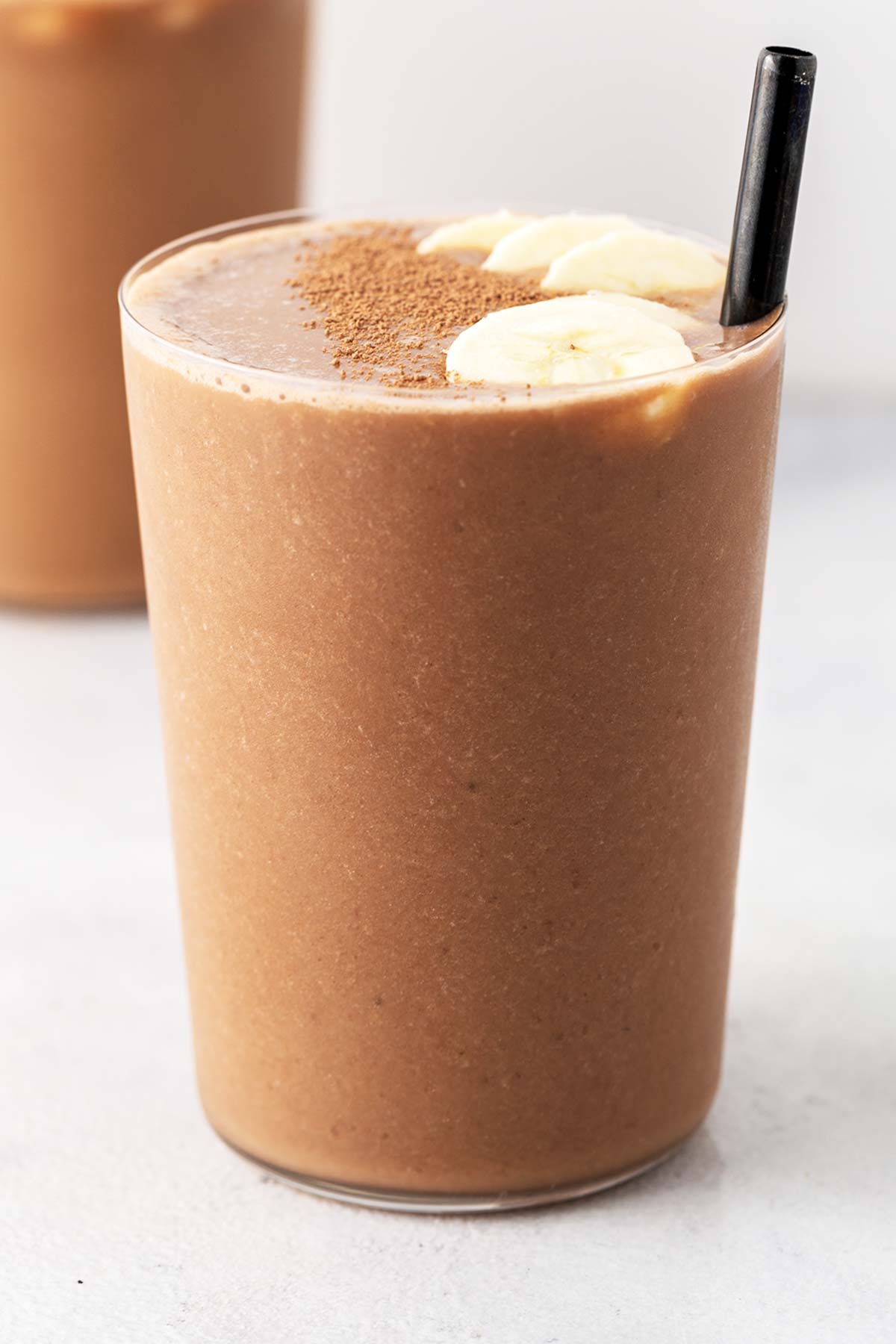 Chocolate collagen smoothie in a glass.