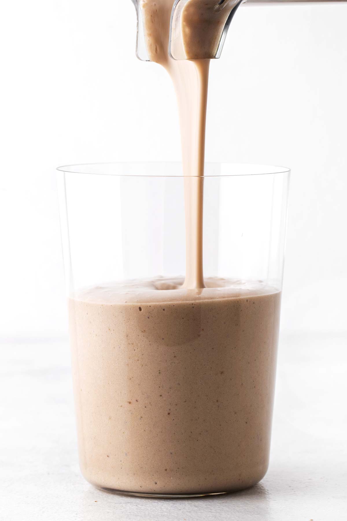 Coffee protein smoothie in a glass.