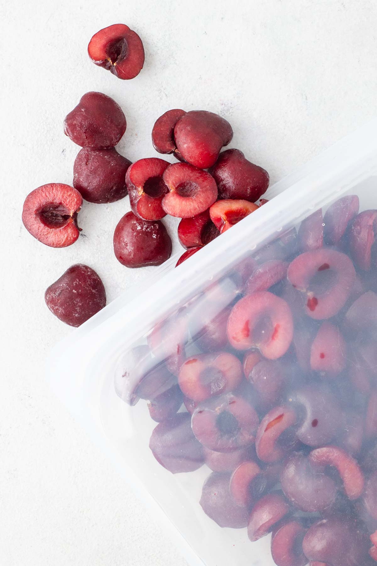 Frozen cherries in a silicone bag.