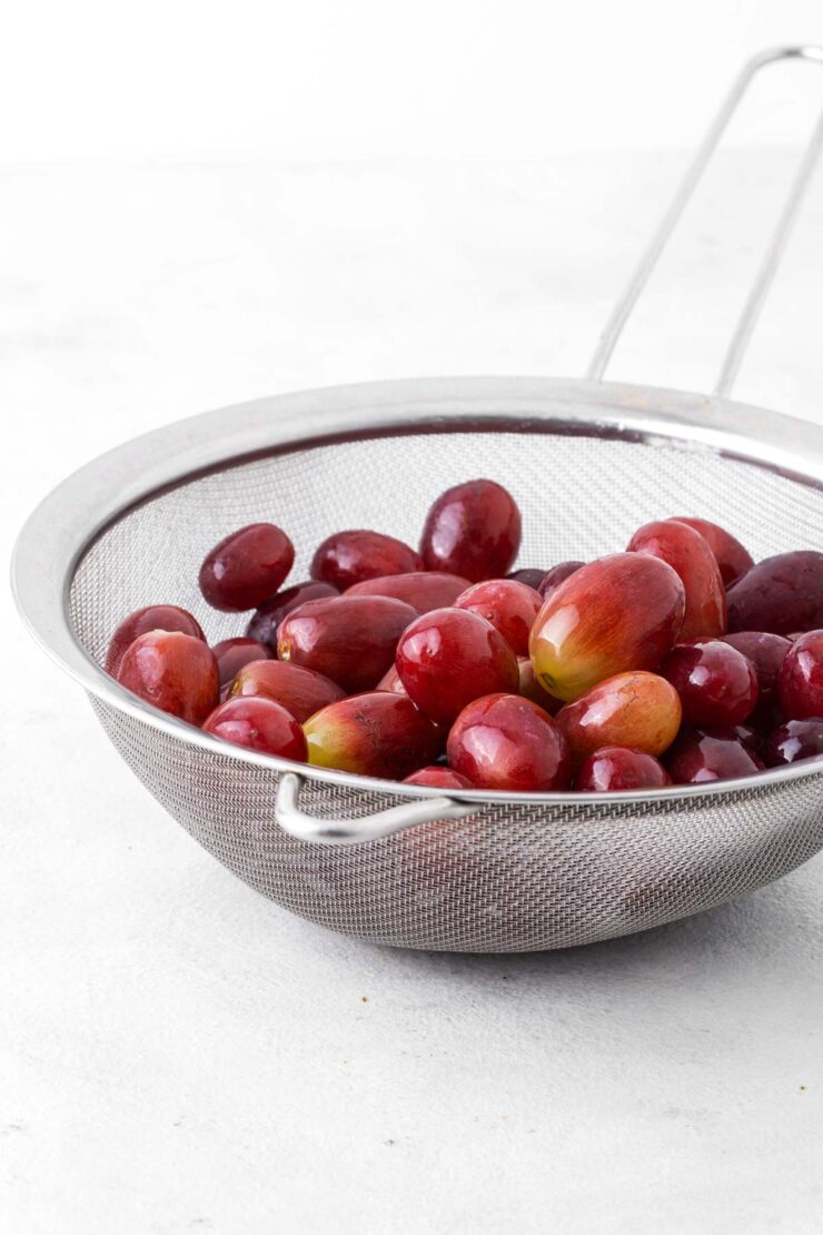 Fresh grapes in a colander.