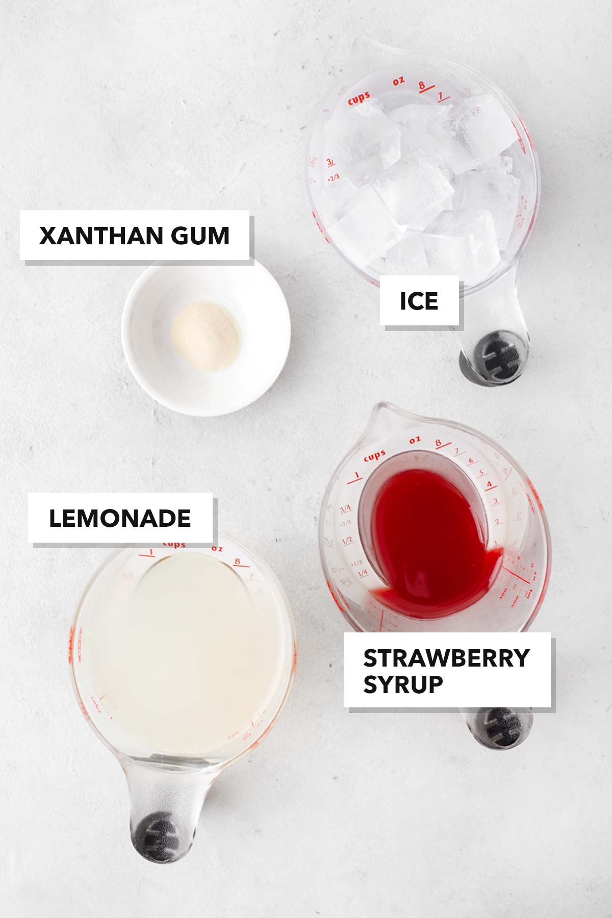 Ingredients for frozen strawberry lemonade.