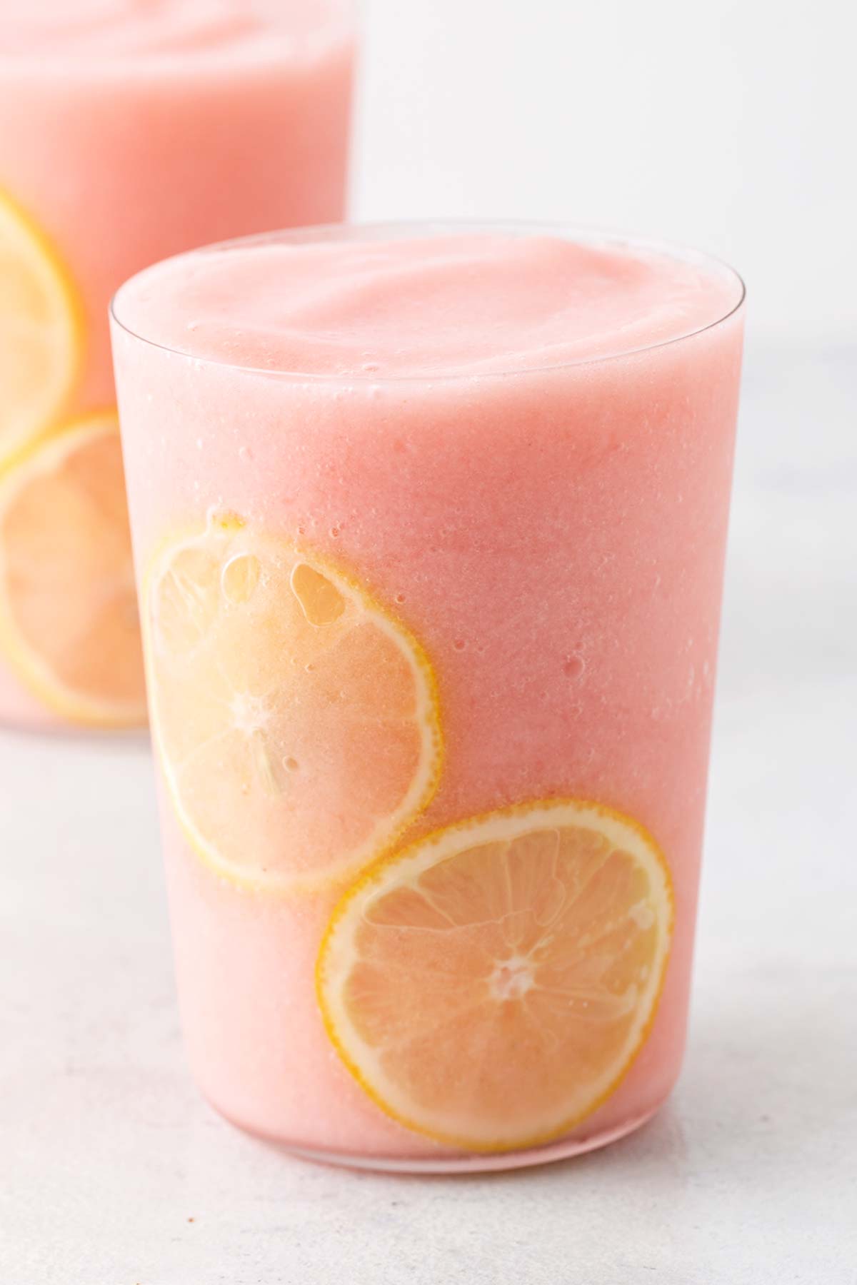 Frozen strawberry lemonade in a glass.