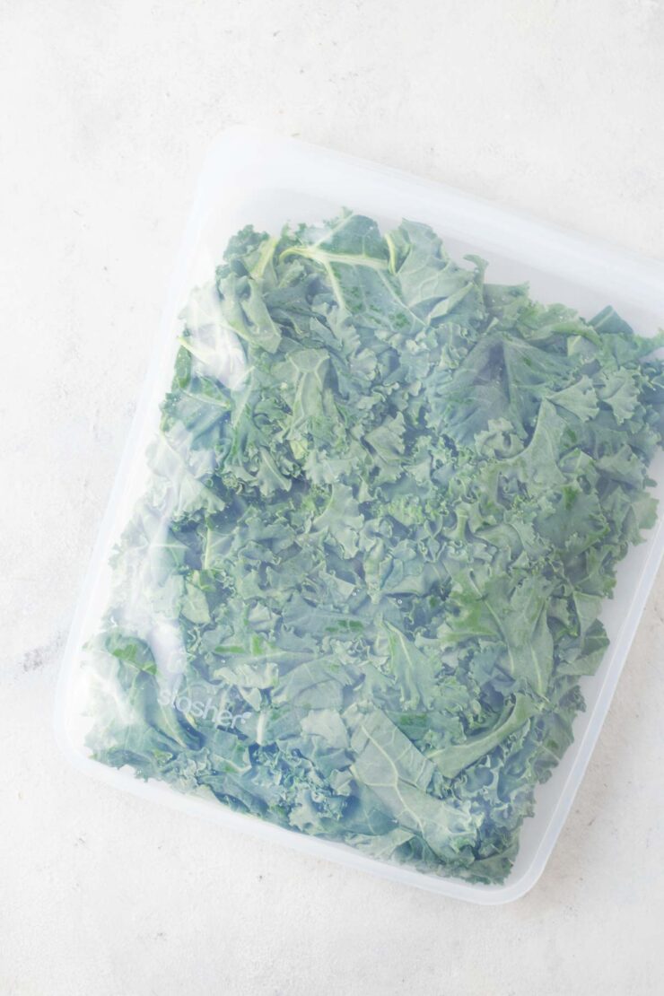 Frozen kale with a silicone storage bag.