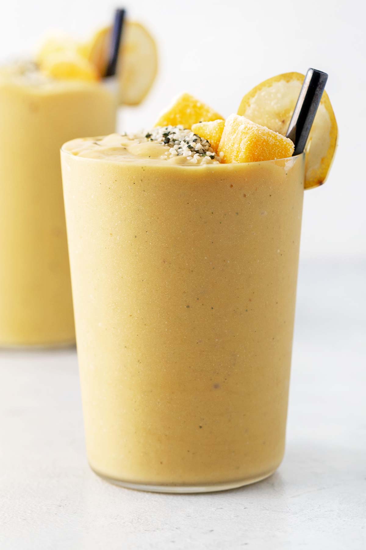 Mango smoothie in a glass.
