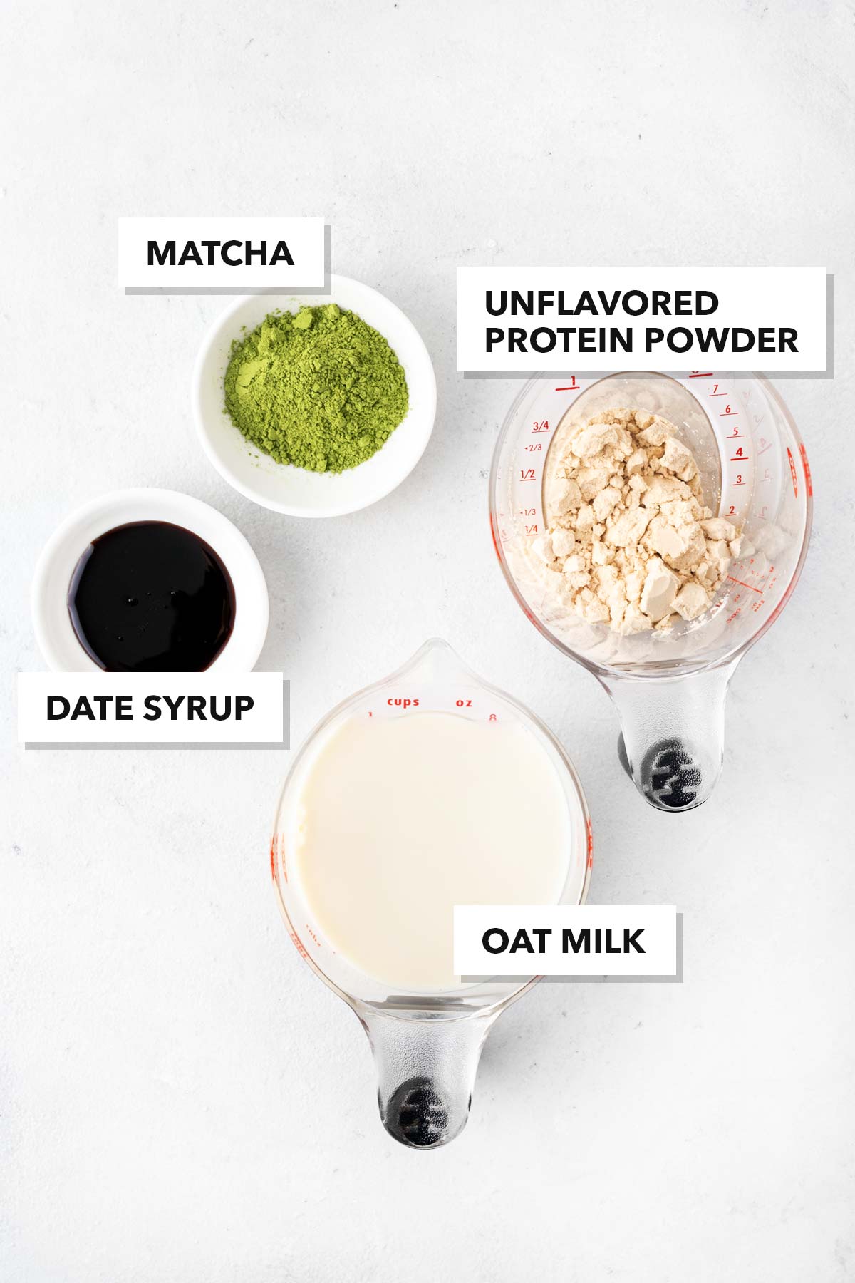 Ingredients for a matcha protein shake.