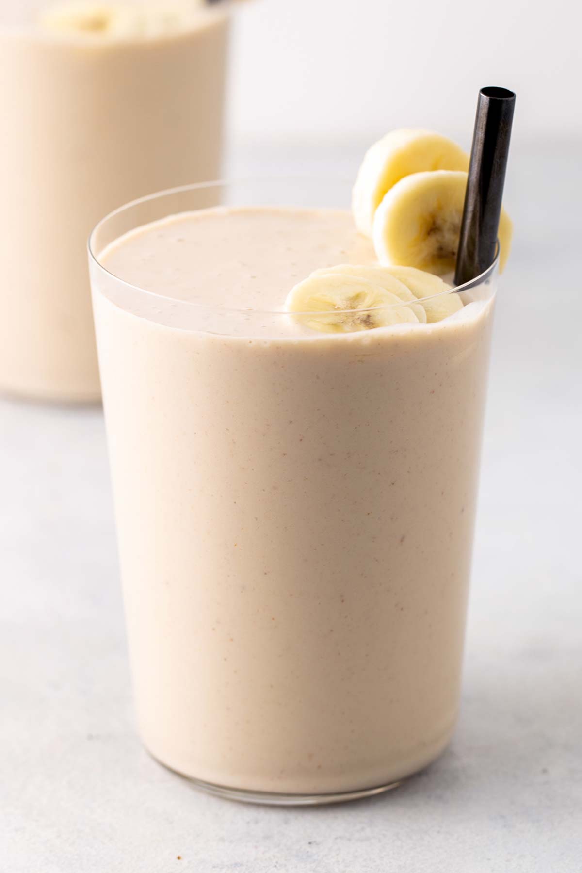 Peanut butter smoothie in a glass.