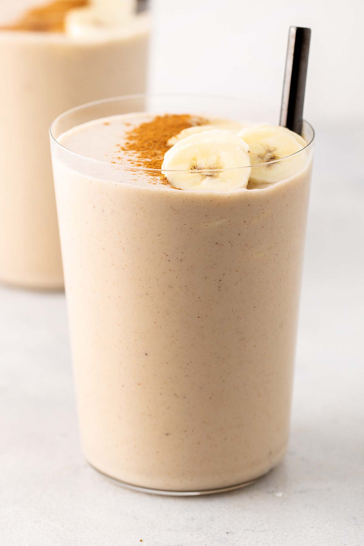Peanut butter smoothie in a glass.