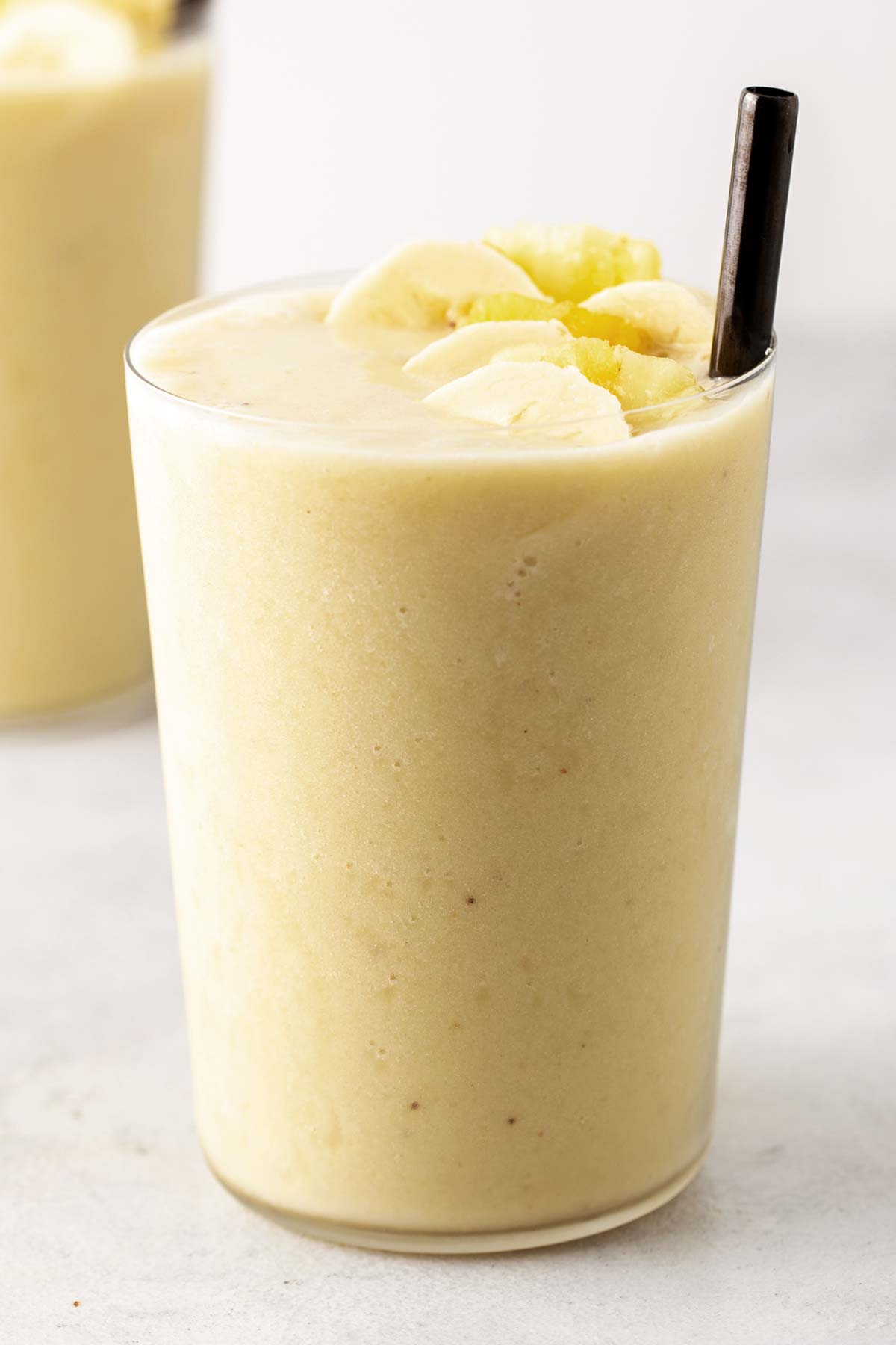 Pina colada smoothie in a glass.