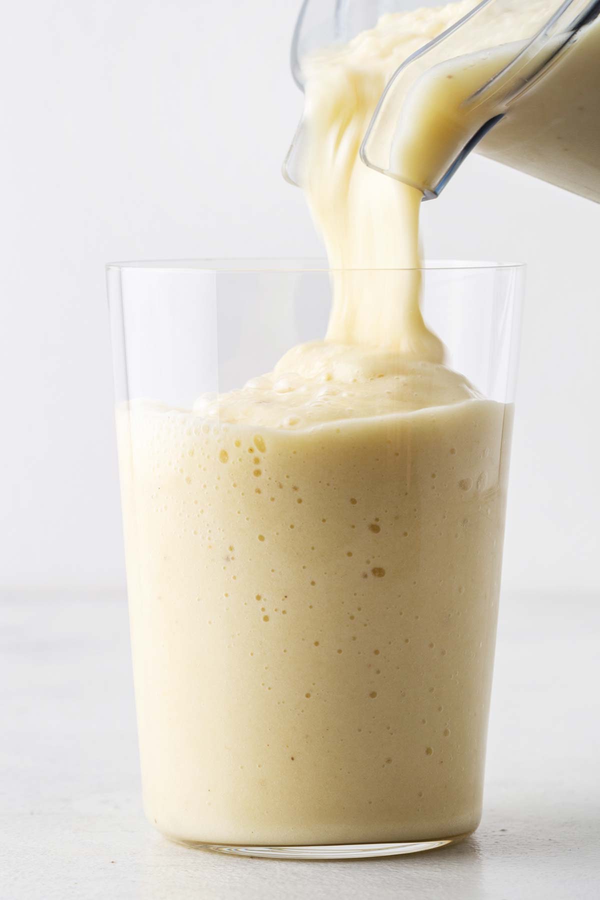 Pina colada smoothie in glass.
