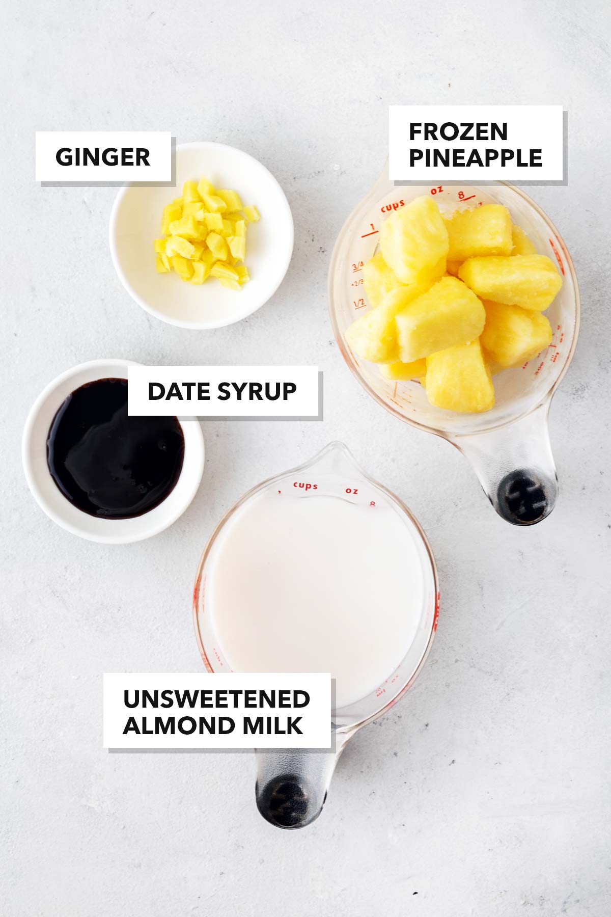 Ingredients for a pineapple ginger smoothie.