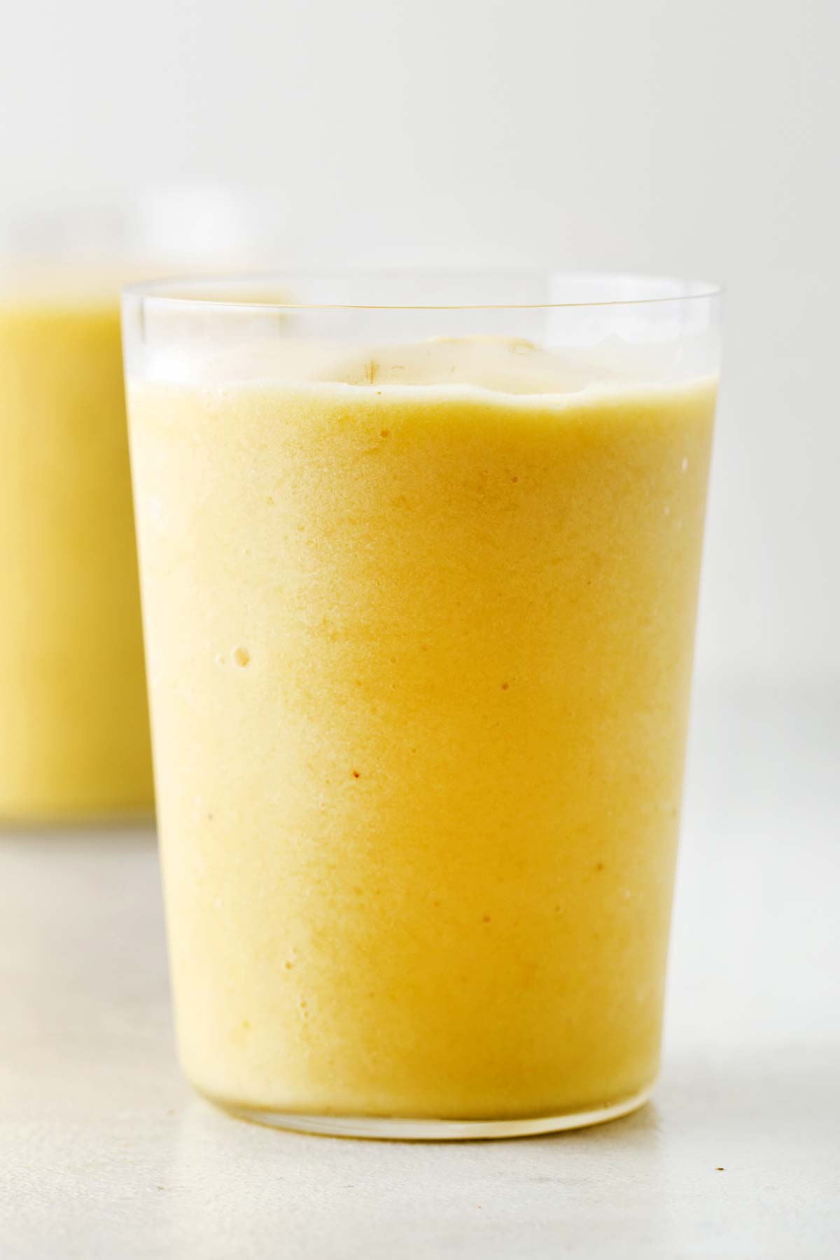 Pineapple smoothie in a glass.