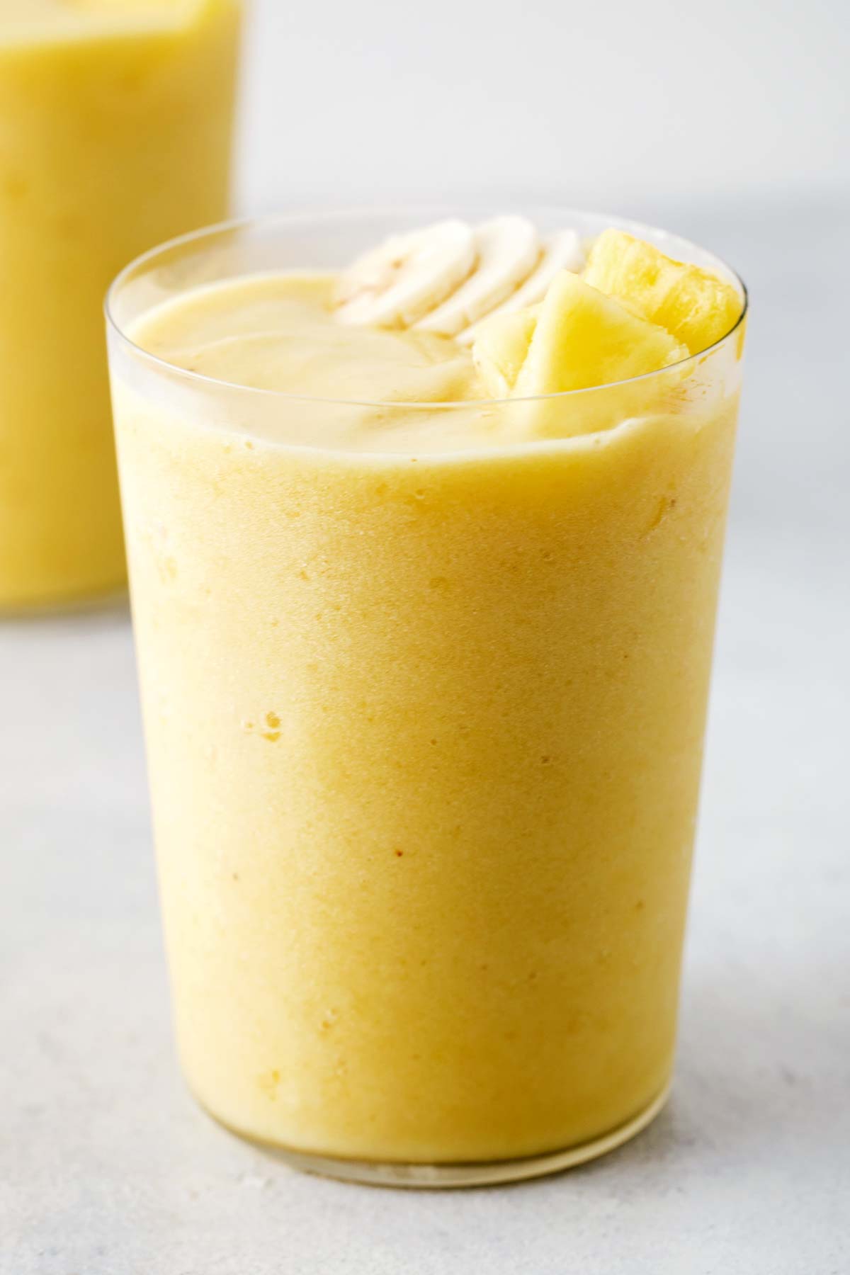 Pineapple smoothie in a glass.