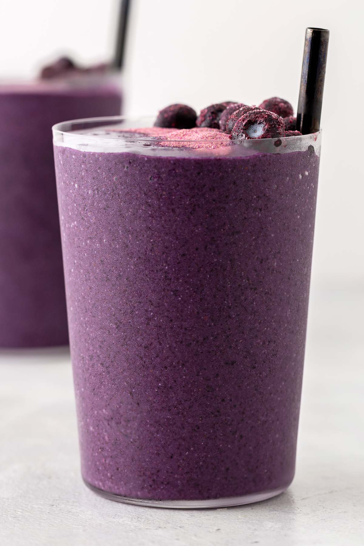 Purple sweet potato smoothie in a glass.