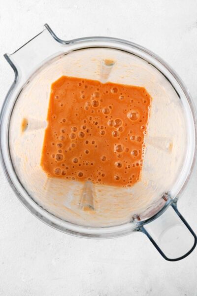Raspberry Mango smoothie blended together. 