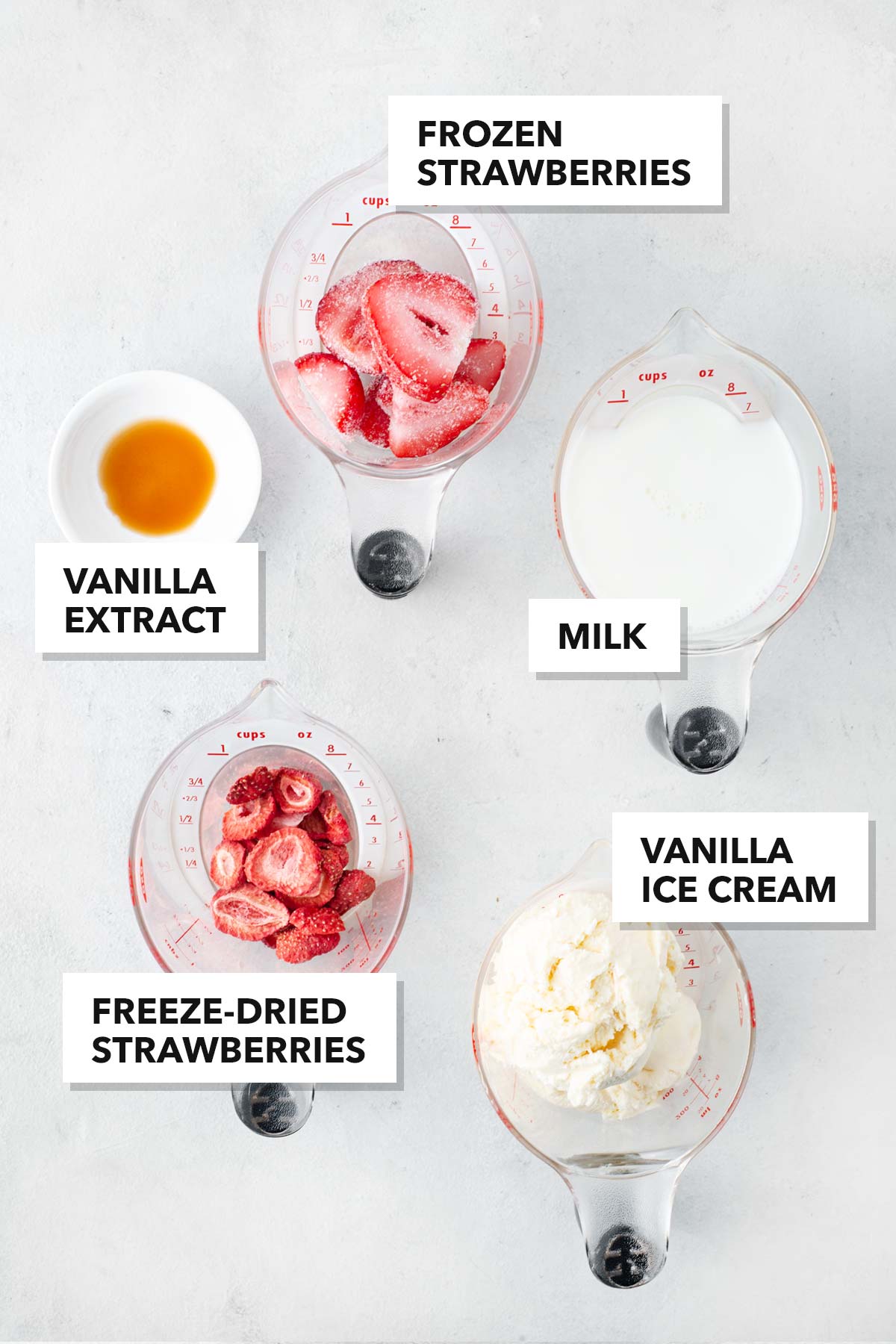 Ingredients for a strawberry milkshake.