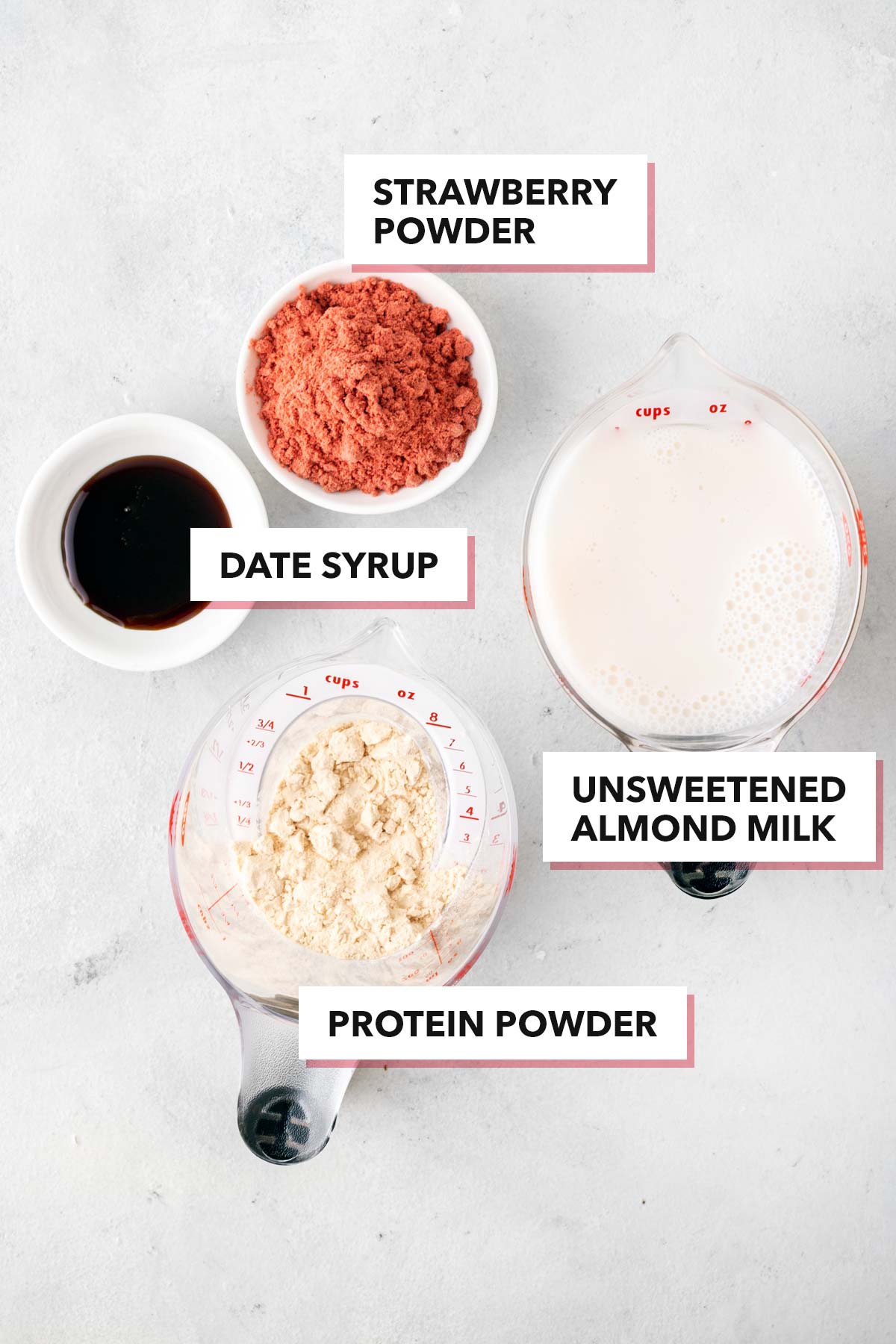 Ingredients for a strawberry protein shake.