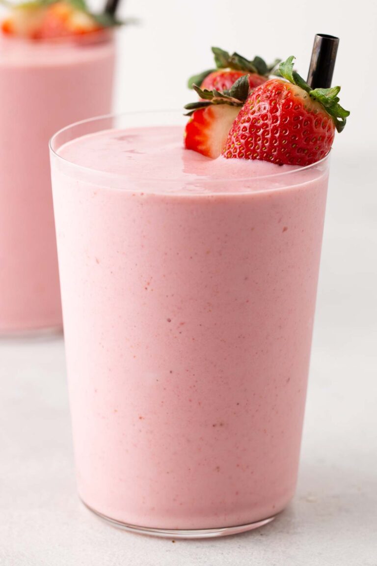 Strawberry smoothie in a cup.
