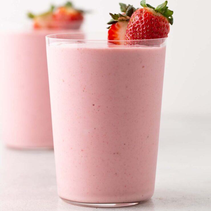 Strawberry smoothie in a cup.
