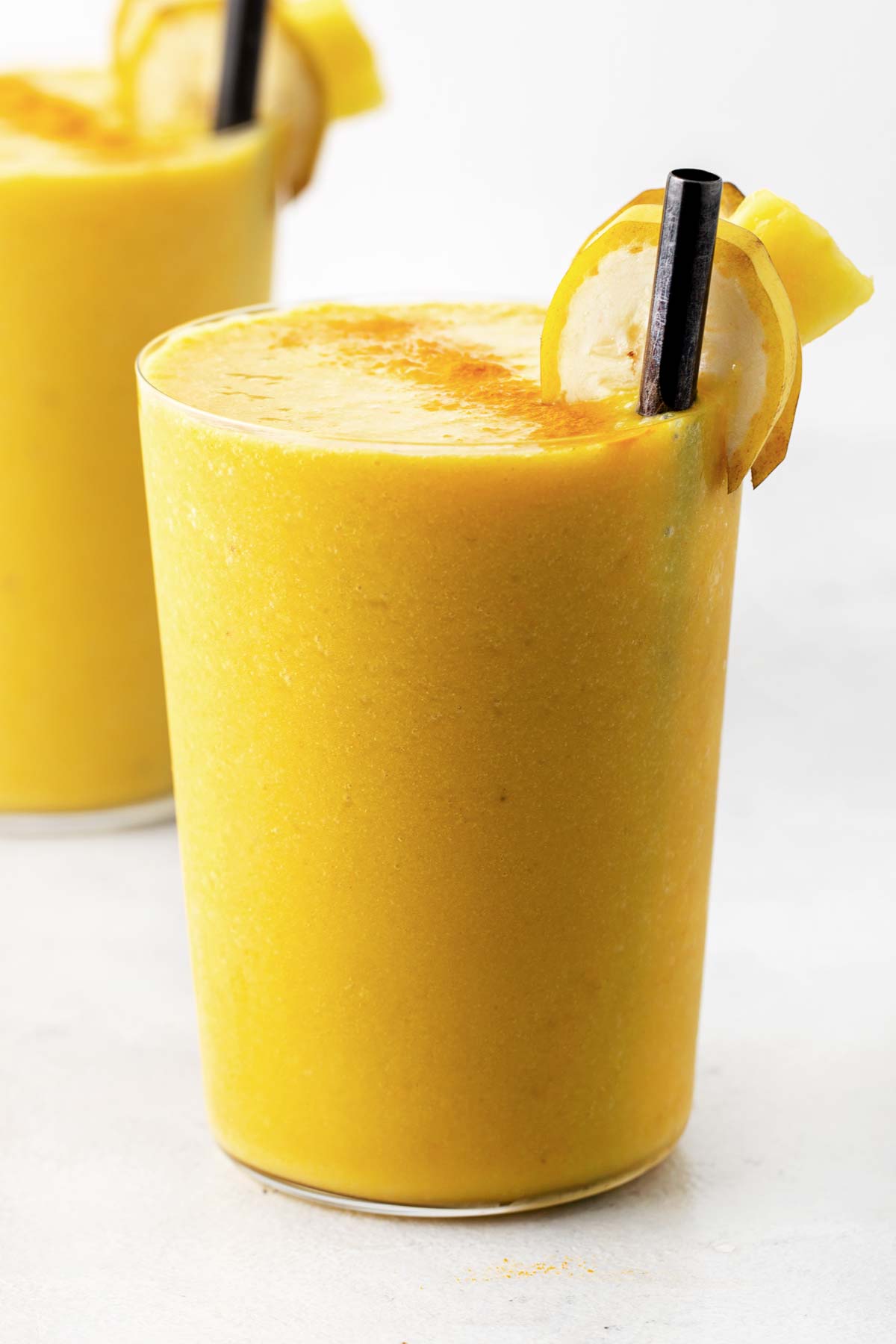 Turmeric smoothie in a glass.