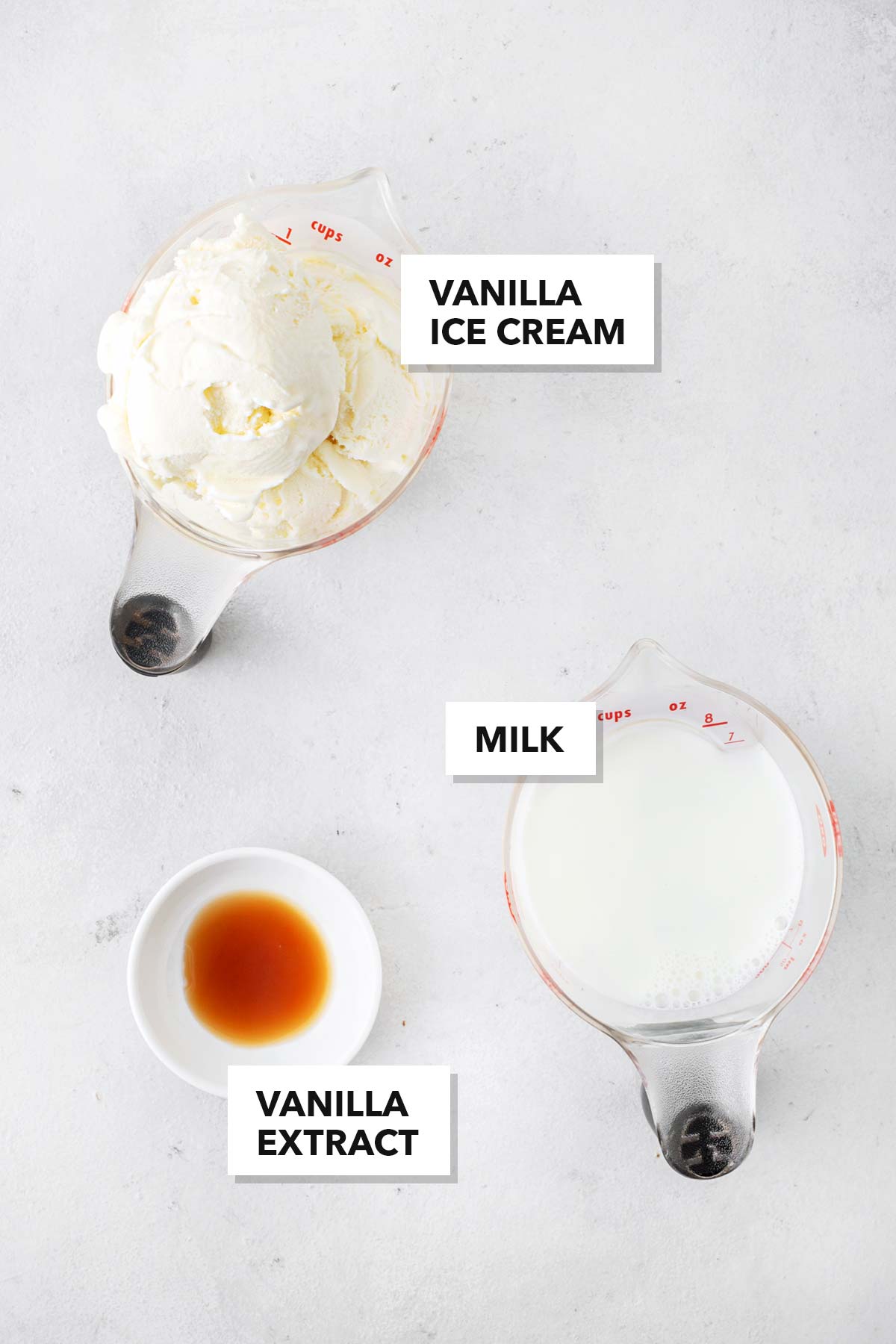 Ingredients for a vanilla milkshake.